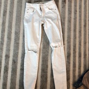 White jeans with knee cut outs